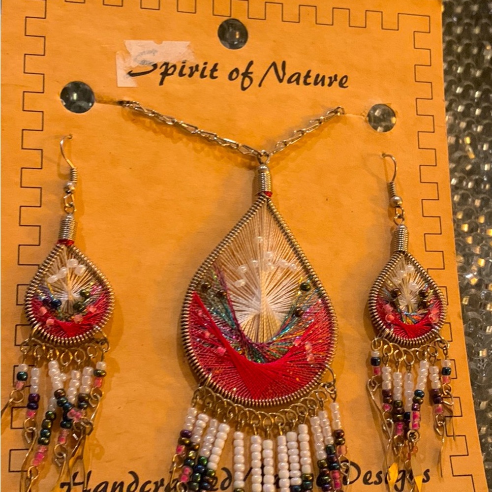 NECKLACE AND EARRINGS PIERCED SOUTHWESTERN STYLE FROM SANTA FE.